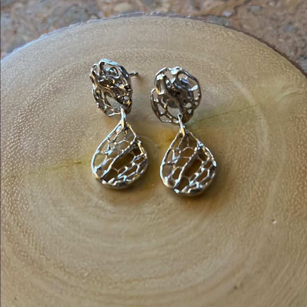 Dainty sterling silver handmade filigree earrings. Great with short hair.